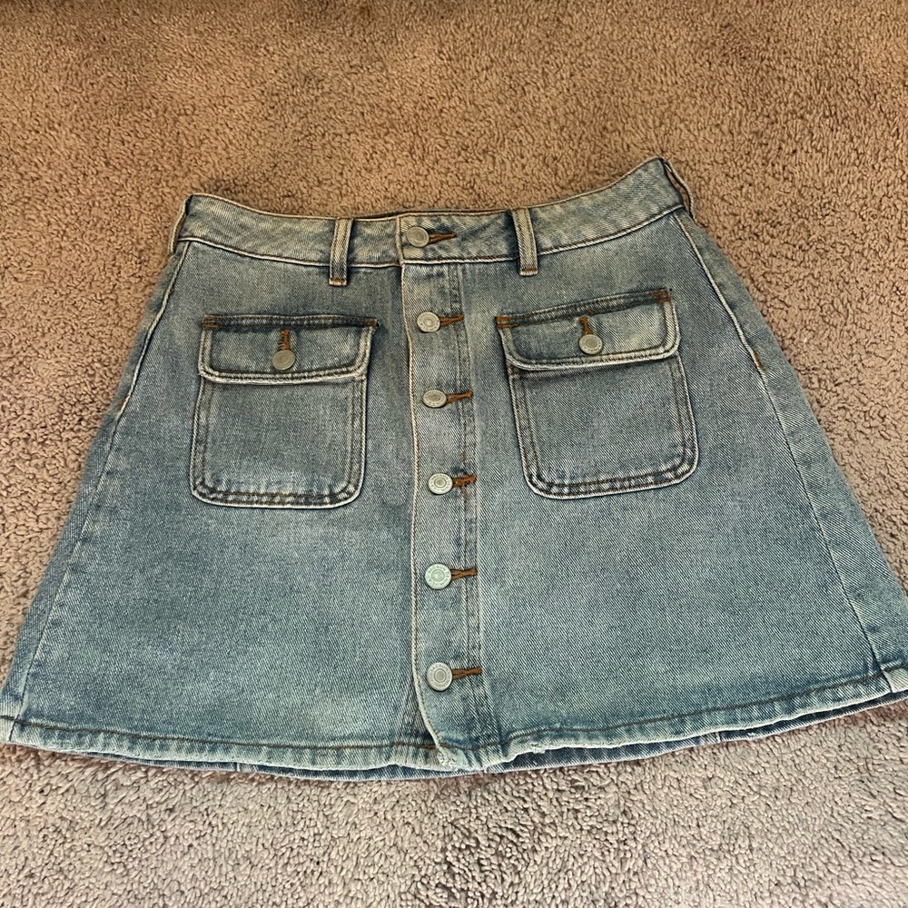 Pacsun denim mini shirt with font pockets and buttons going down the front